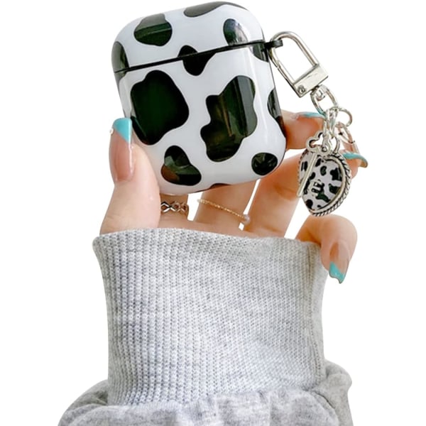 Kompatibel med AirPods-etui med søde ko-sort-hvid nøglering-design