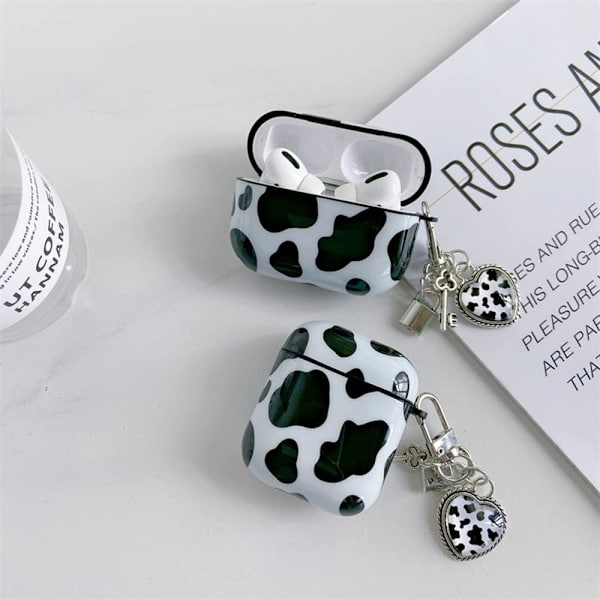 Kompatibel med AirPods-etui med søde ko-sort-hvid nøglering-design