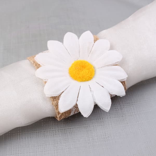 Set med 12 st solrosblommiga servettringar, servett spänne