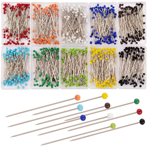 Kuldubbar med stålnålar i 10 färger i omkonfigurerbara behållare för