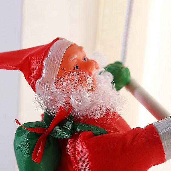 Jultomten klättrar på repsstege julgransprydnad