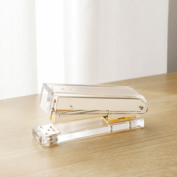 Transparent häftapparat med guldmetall 13*3.5*6.5cm