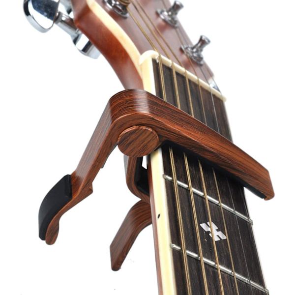 Capo för gitarr i rosenträ med stämgaffel