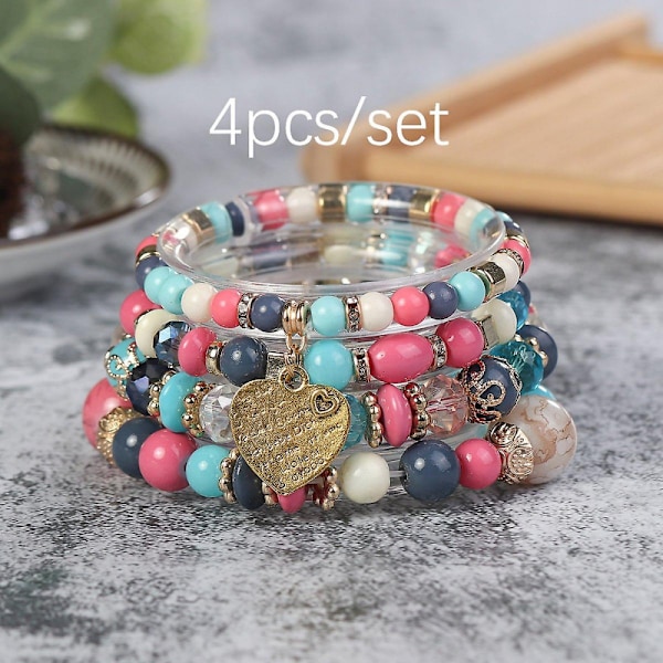 Armband - Fint smyckeCharmigt Boho-armband, Unikt hjärthänge