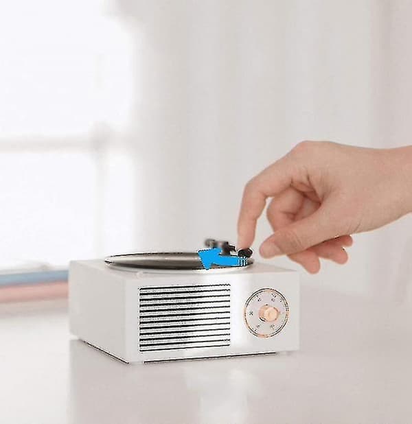 Bluetooth-langaton kaiutin, retro vinyylilevy-CD-tyylinen soitin.