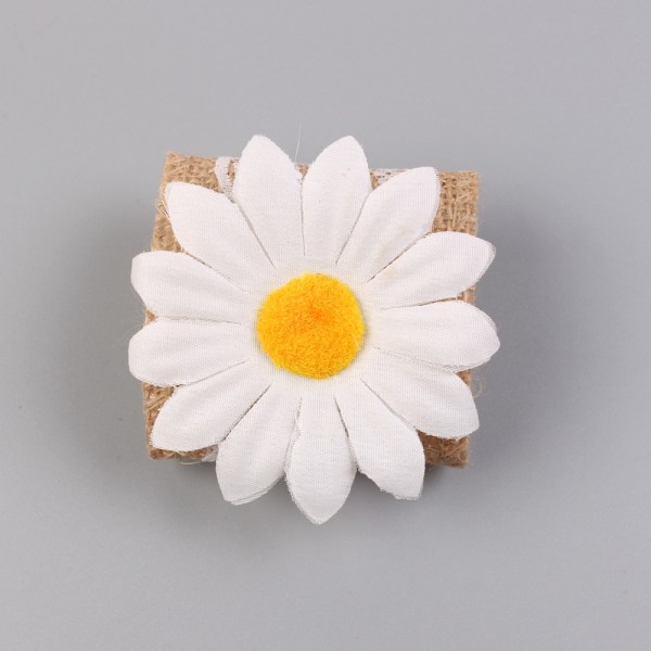 Set med 12 st solrosblommiga servettringar, servett spänne