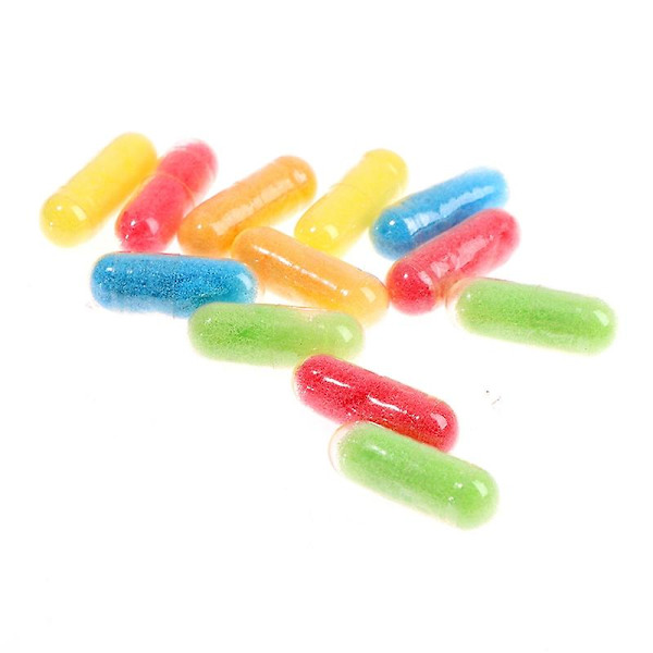12 st/set tecknade dinosaurie leksaker badleksak växer kapsel 1 set ny magisk mjuk A