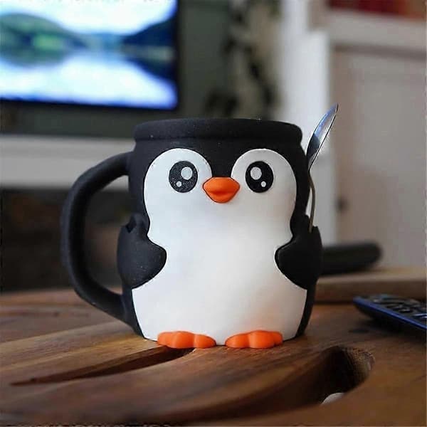 Söpö pingviini-jäätelöpurkin pidike lusikkapaikalla