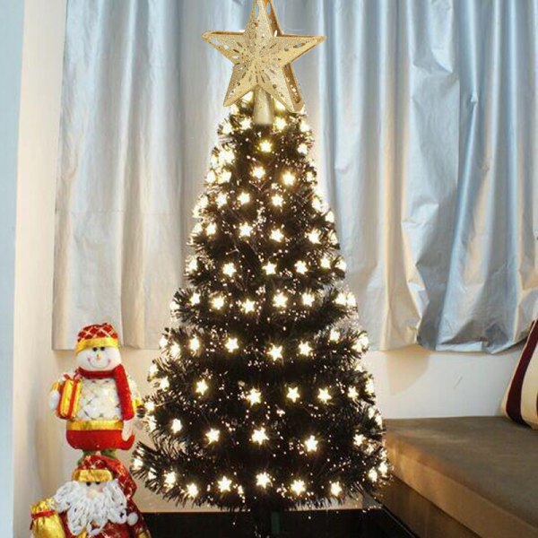Juletræ toppet med snefnugspotlys med roterende snefnug LED-projektor