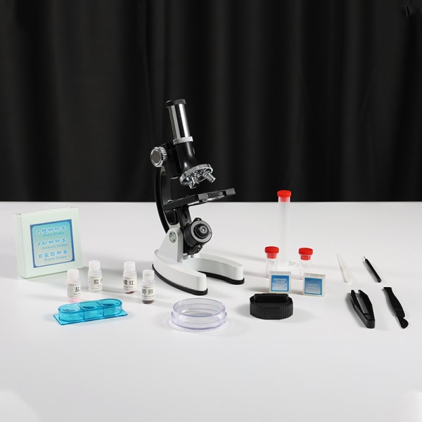 Engros mikroskopsett AKX-M1 300X 600X 1200X Monokulært leketøy for barn Biologisk skolevitenskapsmikroskop for barn White