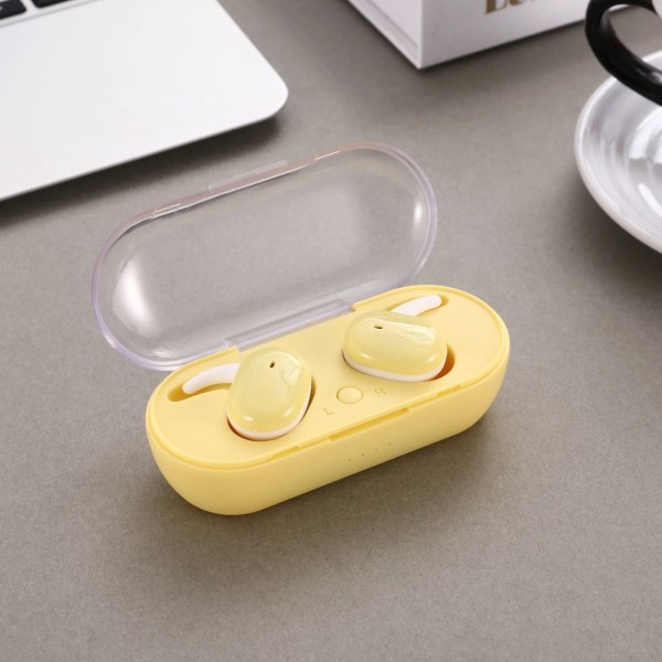 Stereo mini hovedtelefoner til at lytte til musik og foretage telefonopkald Trådløse in-ear mini stereo hovedtelefoner Gul yellow