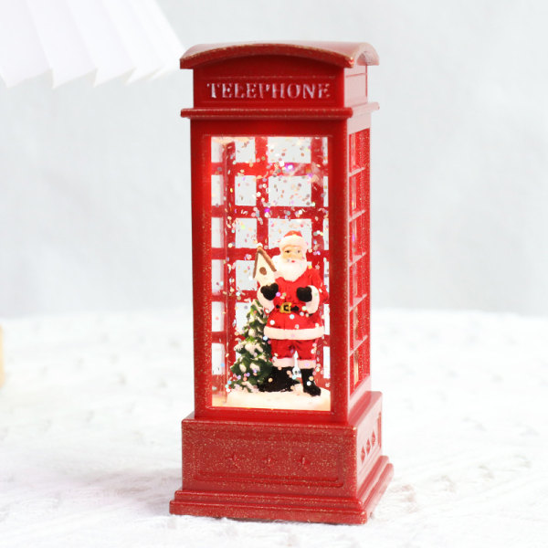 Den første glødende nissen i telefonkiosken, den røde telefonkiosken. Christmas Wind Lantern Crystal Light
