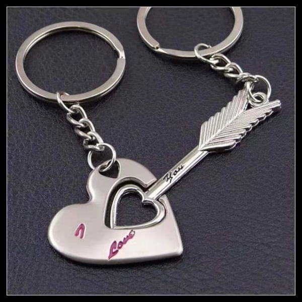 2 stycken/förpackning Hjärtformad pil nyckelring hänge, pil genom hjärta liten gåva, silver