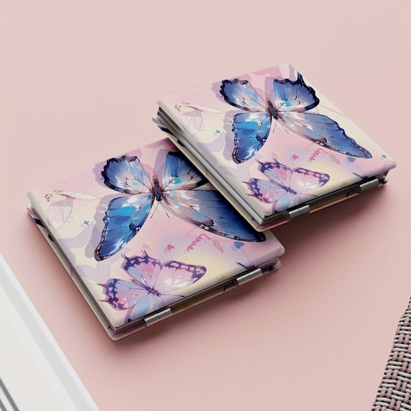 Foldbart spejl med sommerfuglemønster, dobbeltsidet, kompakt kosmetisk touch-up spejl, mini makeup spejl, transportabelt til rejser og udendørs brug
