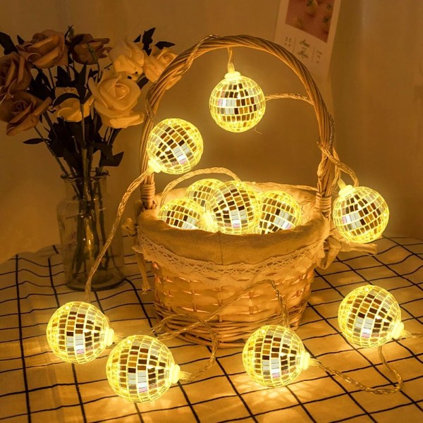 Pakkaus, jossa 10 LED-discopalloa, 150 cm riippuvat marokkolaiset valonauhat hopeanväriset LED-jouluvalot sisätiloihin