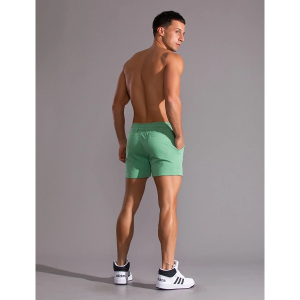 Kesäjuoksu Urheilushortsit Miesten Quick Dry Gym Lenkkeilyshortsit Beach Pocket Kehonrakennus Fitness Shortsit Miesten merkin kuntosalivaatteet Green XL