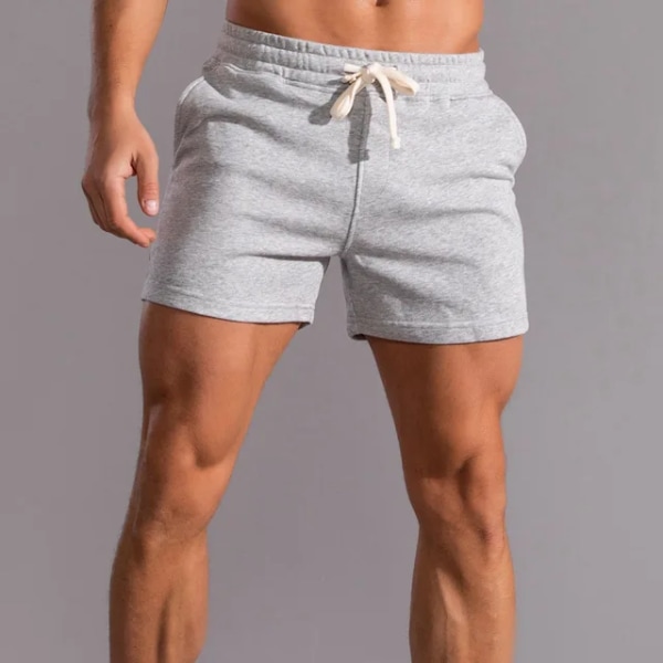 Kesäjuoksu Urheilushortsit Miesten Quick Dry Gym Lenkkeilyshortsit Beach Pocket Kehonrakennus Fitness Shortsit Miesten merkin kuntosalivaatteet light gray M