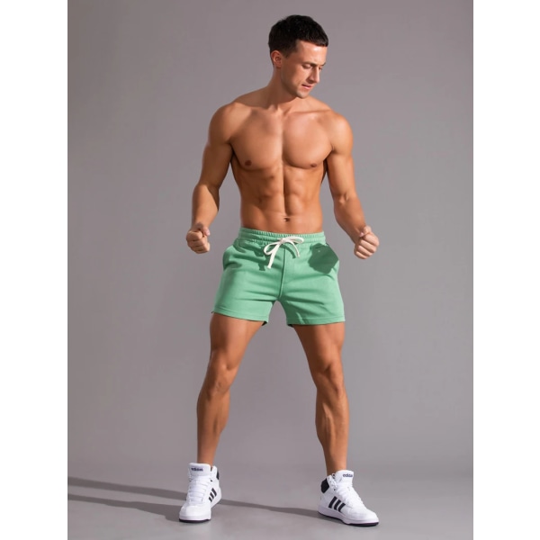 Kesäjuoksu Urheilushortsit Miesten Quick Dry Gym Lenkkeilyshortsit Beach Pocket Kehonrakennus Fitness Shortsit Miesten merkin kuntosalivaatteet Green 4XL