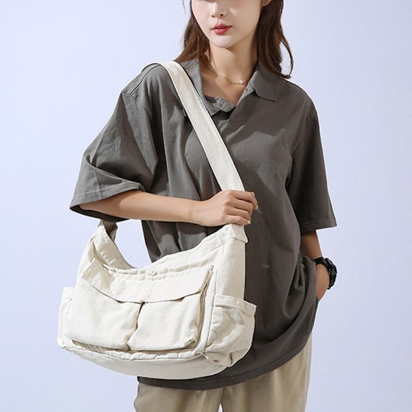 Konstnärlig och unisex skolcrossbody axelväska i solid färg med stor kapacitet, casual canvas studentväska för både pojkar och flickor Beige