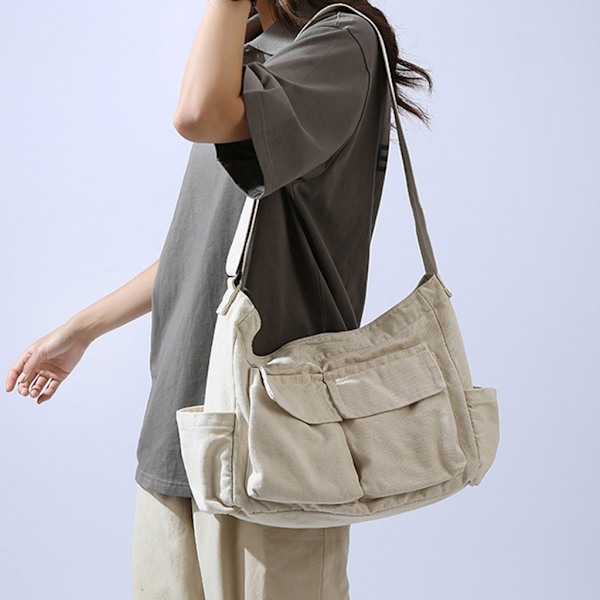 Konstnärlig och unisex skolcrossbody axelväska i solid färg med stor kapacitet, casual canvas studentväska för både pojkar och flickor Beige