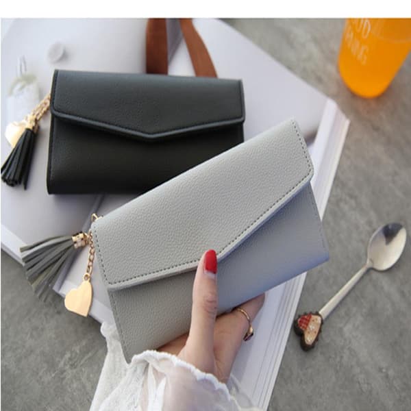Plånbok i kuvertväska i clutchmodell black