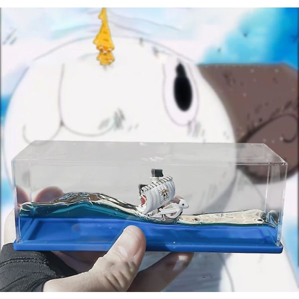 Anime One Piece Going Merry Cruise Ship Model Liquid Wave Osänkbar båt Leksaker Hem Skrivbord Dekorationer Fläktar Presenter