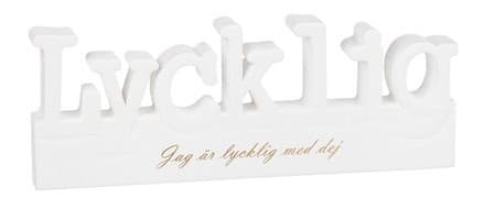 Skylt Lycklig i trä, 20 cm