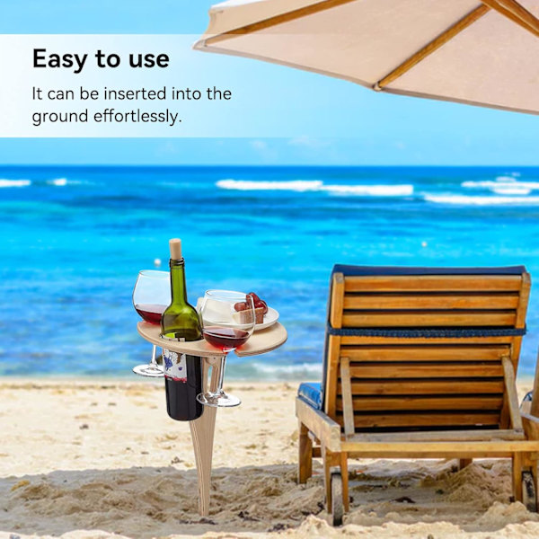 Trävinbord för picknick på stranden med hållare för vinflaska och glas