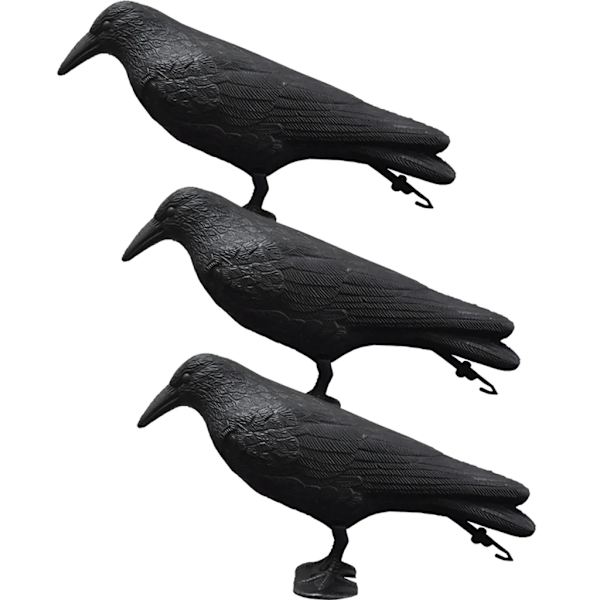 Fugleskremsel i form av en sittende kråke, sittende svart kråke, dekorative kråkefigurer