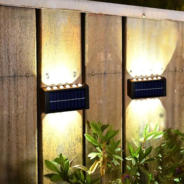 Aurinkokäyttöinen seinävalaisin ulkokäyttöön, ylös- ja alaspäin suuntautuvat valot, 12 LED:n aurinkovalot IP65 vedenpitävä seinävalaisin, LED-puutarhavalaisin, puutarhavalot, lämmin valkoinen