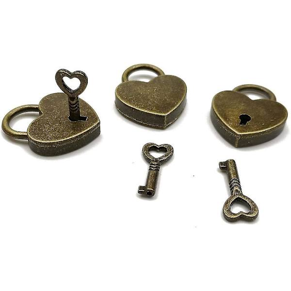 2 vintage -tyylisen antiikkisen miniriippulukon set avaimilla - pronssiset antiikkiset miniriippulukot (sydän)