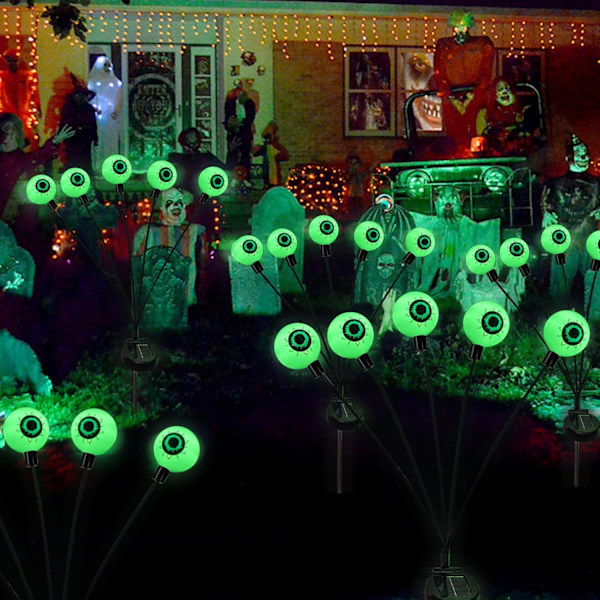 Häikäisevät Halloween-koristeet ulkona, 2 pakkausta 10 LED:n aurinkosilmäpolkuvaloa, pelottavat vedenpitävät aurinkokäyttöiset vihreät tulikärpäset puutarhanurmelle