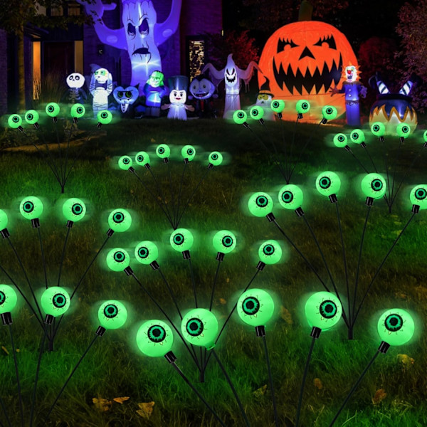 Häikäisevät Halloween-koristeet ulkona, 2 pakkausta 10 LED:n aurinkosilmäpolkuvaloa, pelottavat vedenpitävät aurinkokäyttöiset vihreät tulikärpäset puutarhanurmelle