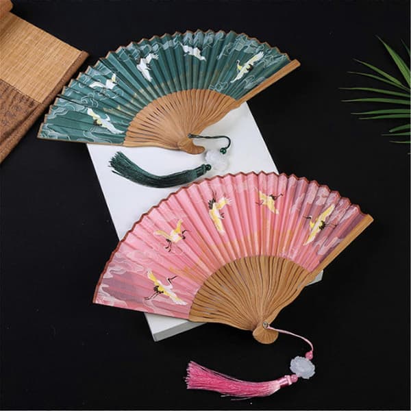 Classic Traditional Design Folding Bamboo Silk Hand Fan Offering Elegance and Versatility, Compatible with Various Occasions, Pink Pink