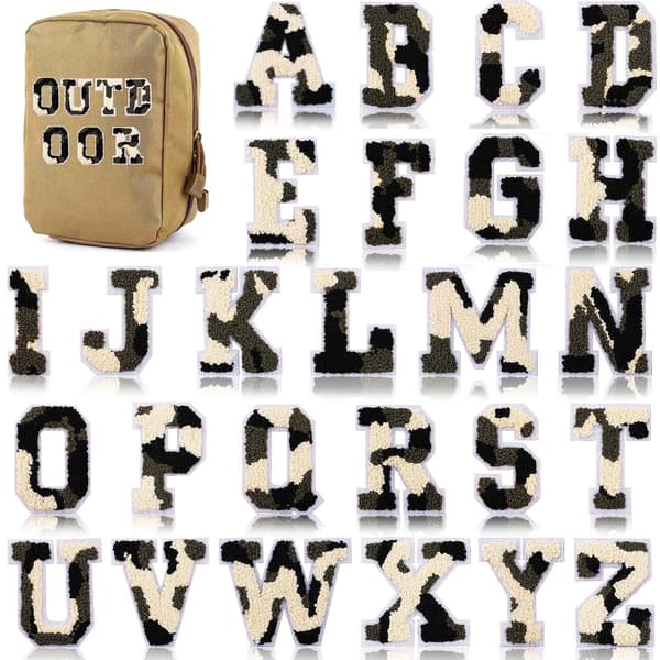 26 kirjottua monogrammia maastokuviossa ompeluun