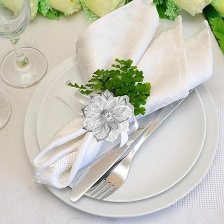 (Sølv) Sett med 12 serviettringer i legering med hule blomstermotiver