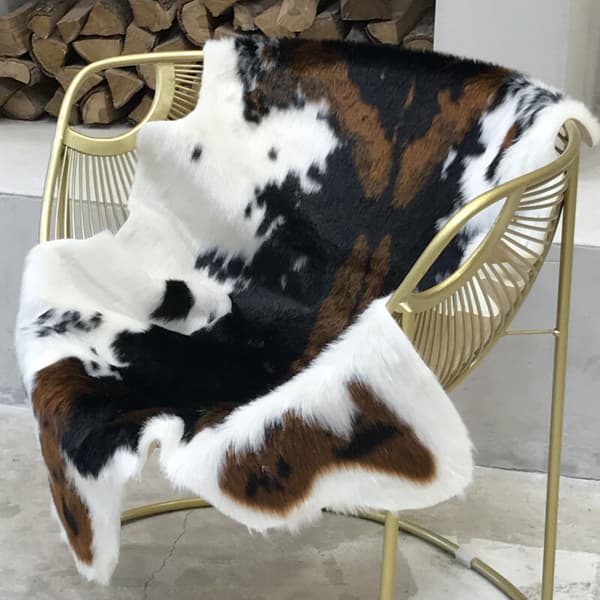 Faux Fur Cowhide Print Children's Rug, 110 x 85 cm. Durable Polyester. Non-slip Latex Backing. Soft and Comfortable.