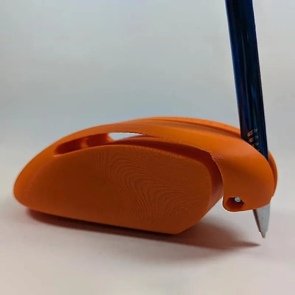 Kirjoitus- ja piirustusapuvälineet, kirjoitusapu kynänpidike Parkinsonin potilaille, ergonomiset kynäotteet orange