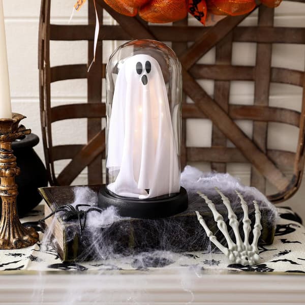 Halloween-koriste, valaistu aave lasikuvussa