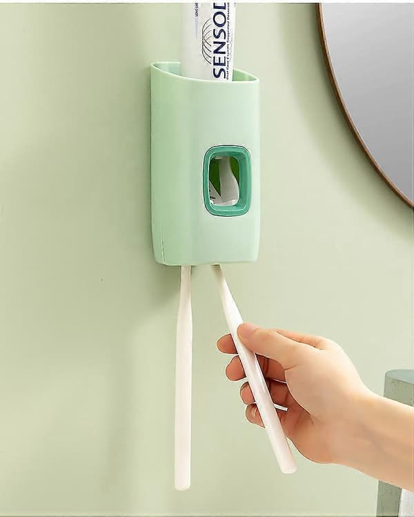 Blå automatisk tandkrämsdispenser Badrumstillbehör