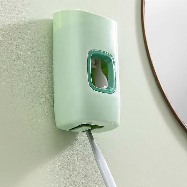 Blå automatisk tandkrämsdispenser Badrumstillbehör