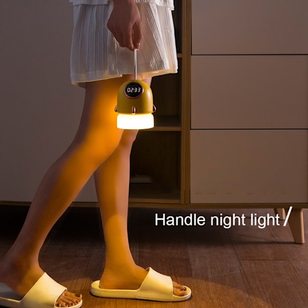 TW-L47 Liten raket bärbar klocka LED projektionslampa (gul)