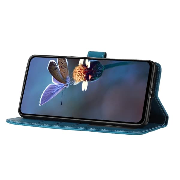 iPhone 16 Pro Max Fodral Läder med Blomsterprägling - Elegant Skal för Skydd och Stil Blå