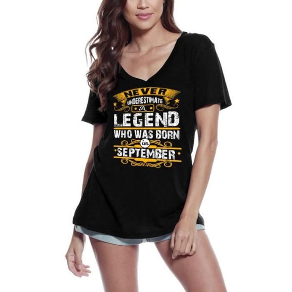 T-shirt med v-ringad dam Underskatta aldrig en legend som föddes i – Underskatta aldrig en legend som föddes i djup svart