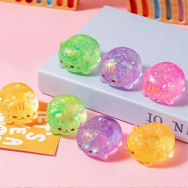 Sød Kat Klemmelegetøj - Blød Elastisk Dekompressionsbold med Glitterdesign 2pcs