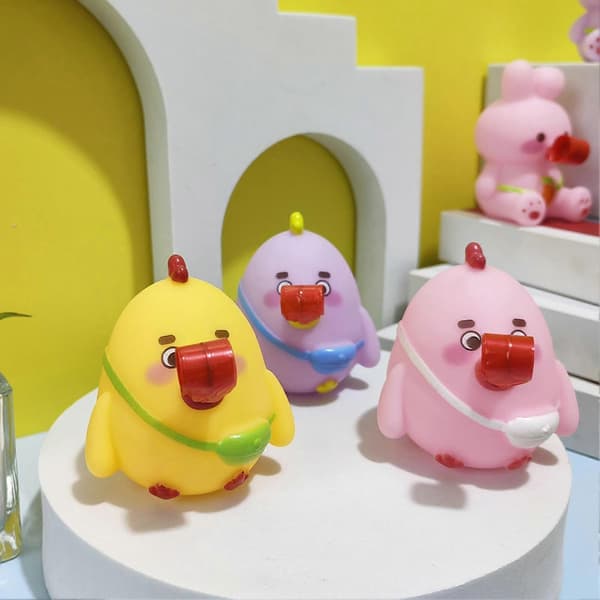 Kieli ulkona -eläinpuristuslelu, sarjakuvajuhlapalvelus Chick