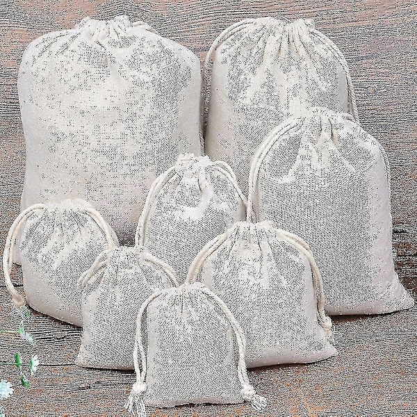 Pakkaus, jossa 30 kpl 8 x 10 cm puuvillapussia kiristysnyörillä, uudelleenkäytettäviä pieniä puuvillapusseja lahjakasseja häihin, askarteluun, jouluun - koko 13x18cm