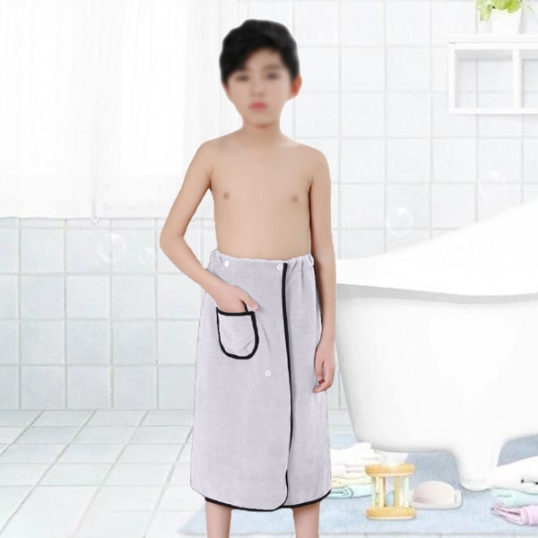 Barnmorgonrockspojkar kan bära badhandduk för simning,