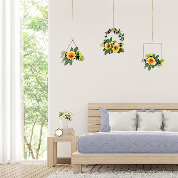 Konstgjord solros/rosbågekrans, set med 3 hängande blommor