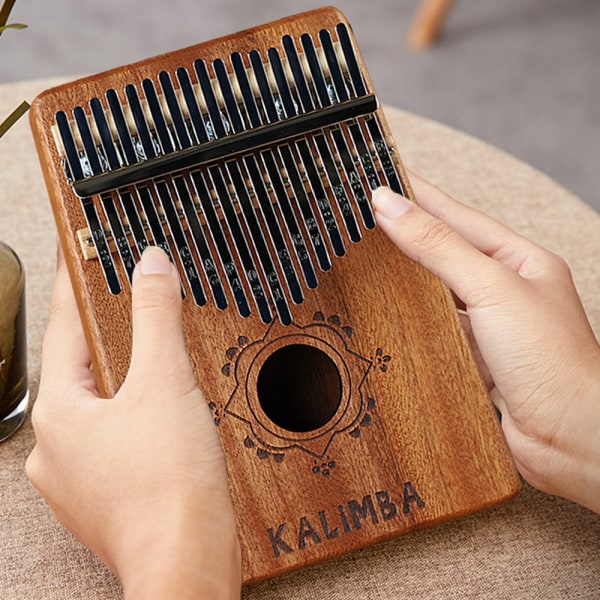 17-tangenters kalimba tummepiano; stämningshammare, fingeröverdrag, tangent